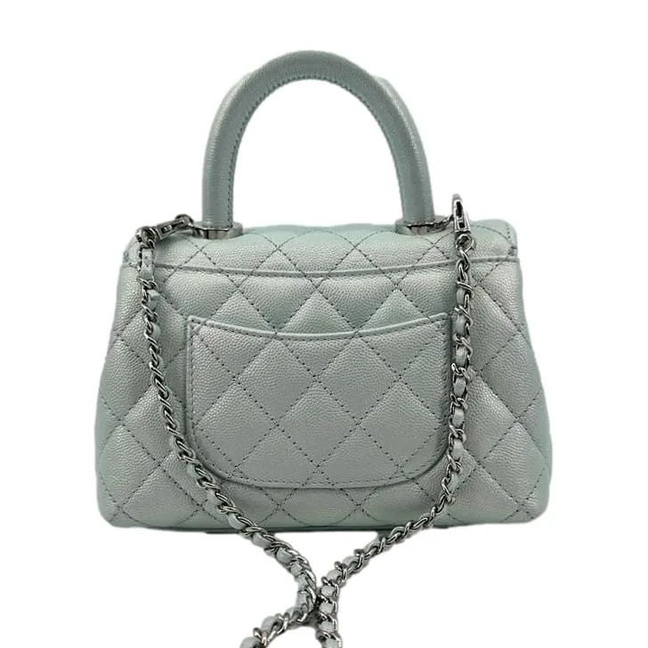 CHANEL Coco Extra Mini Top Handle Iridescent Caviar Leather Crossbody Bag Light Blue