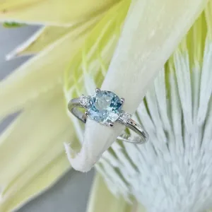Elegant Round Cut Aquamarine and Accent Diamond Ring