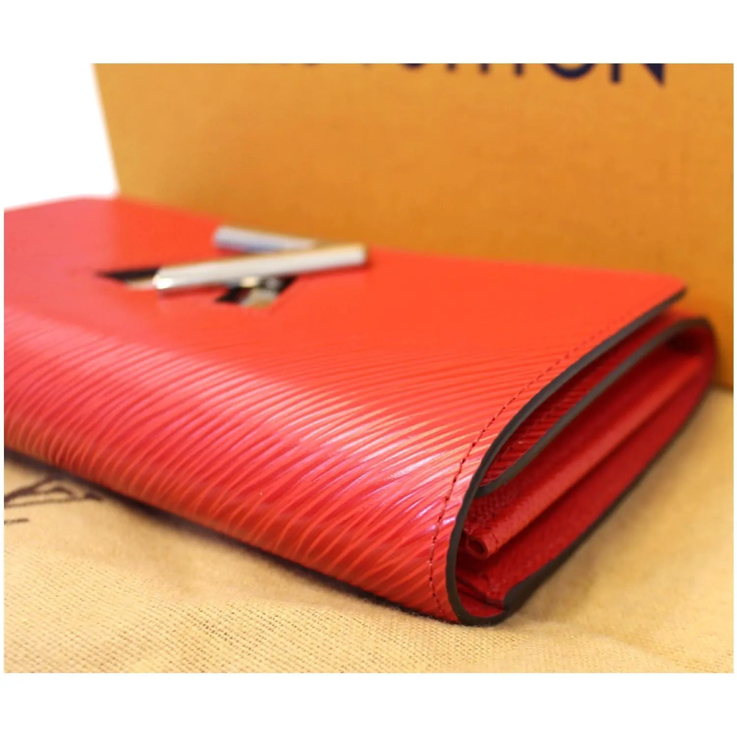 LOUIS VUITTON Twist Epi Leather Coquelicot Wallet