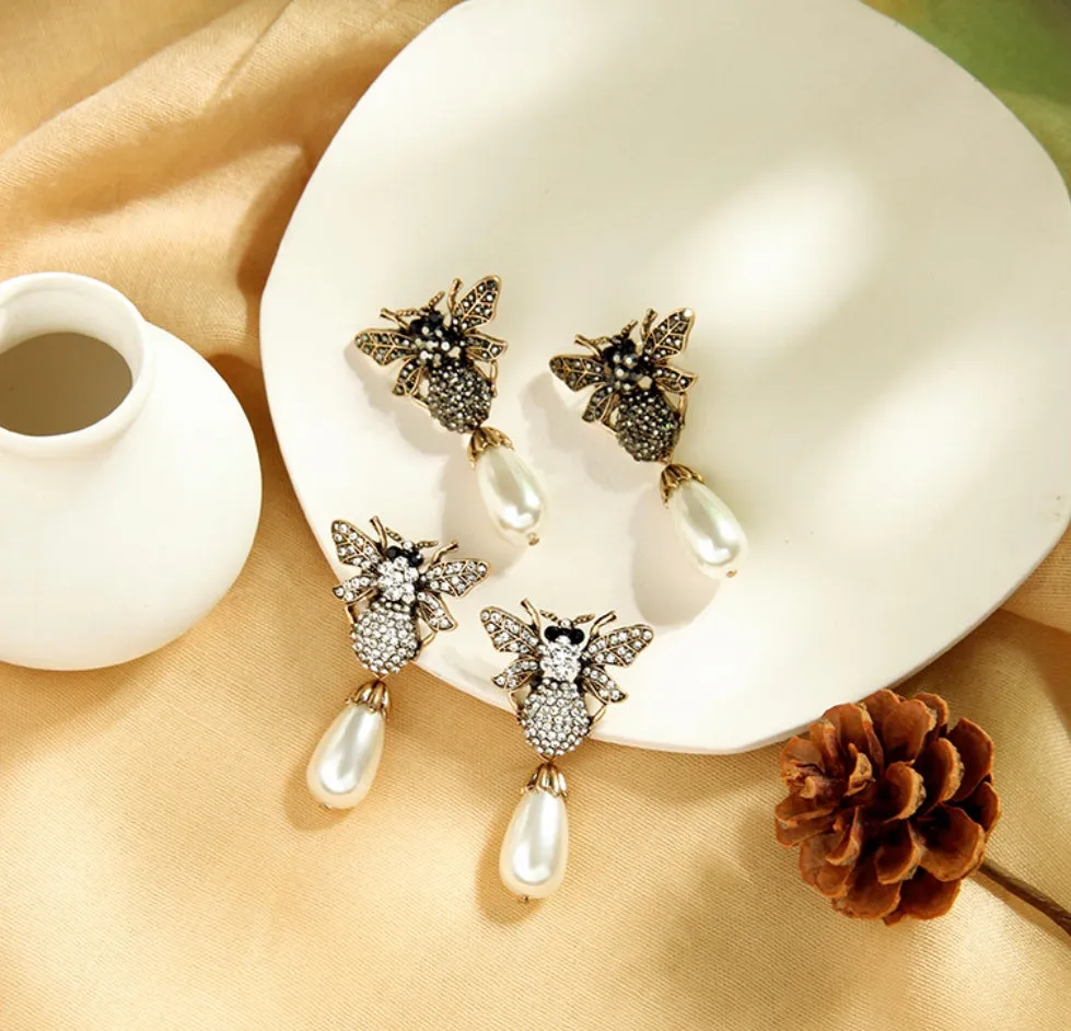 The sparkly brothers beetle earrings