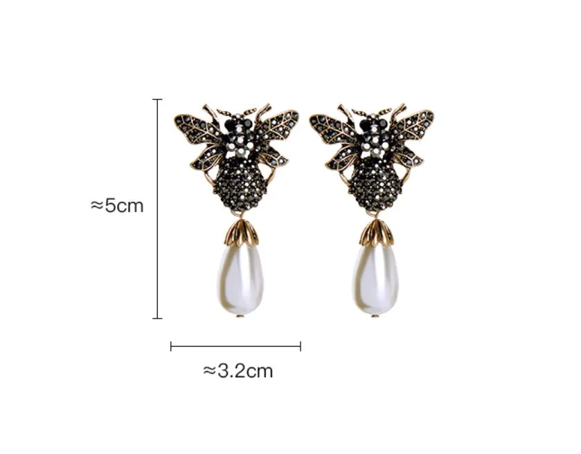 The sparkly brothers beetle earrings