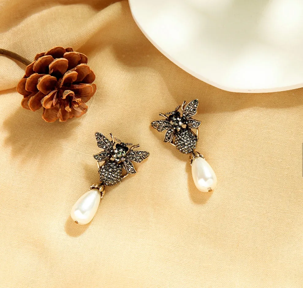 The sparkly brothers beetle earrings