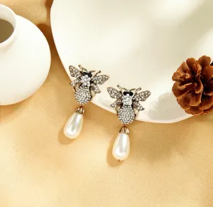 The sparkly brothers beetle earrings